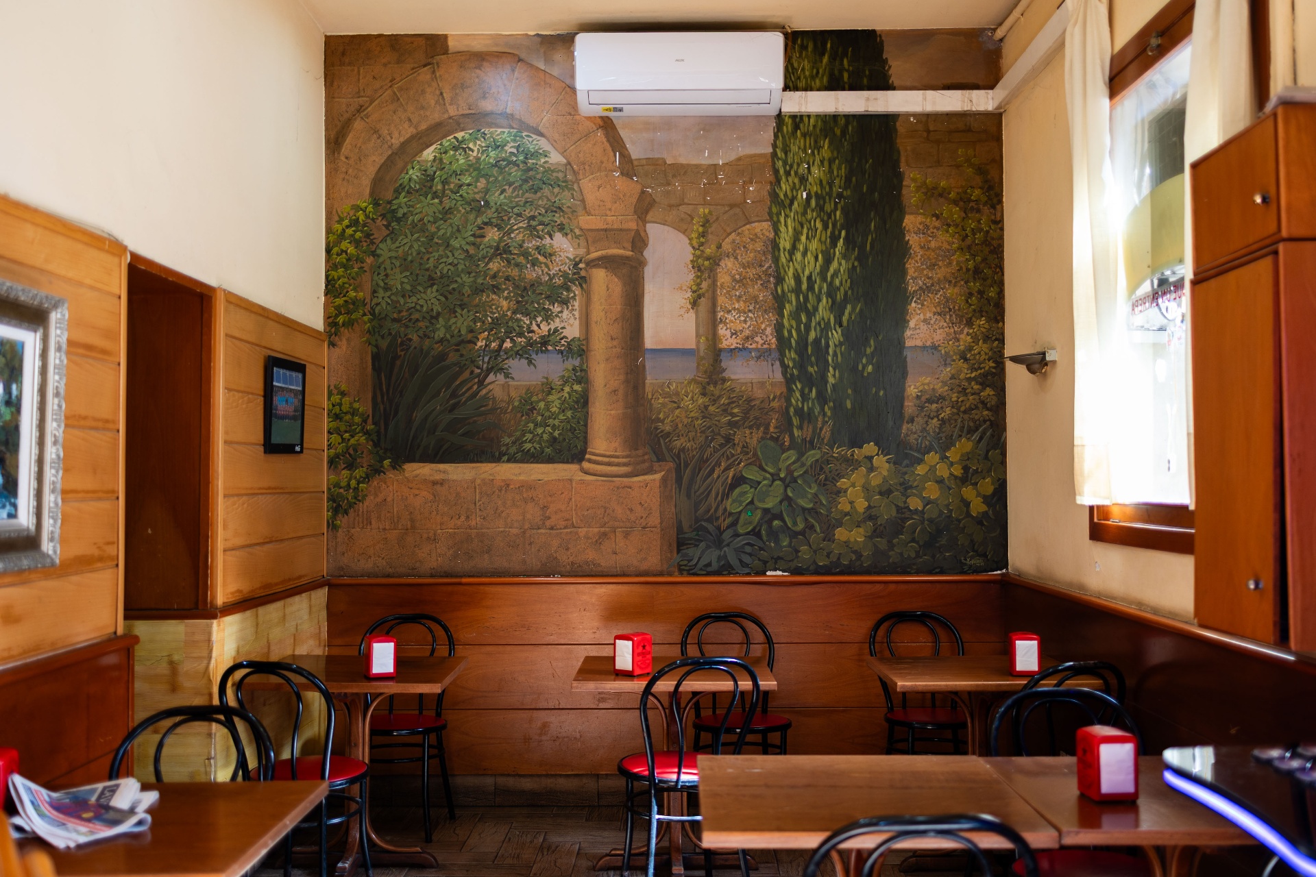 Mural of a Mediterranean garden inside a Barcelona café
